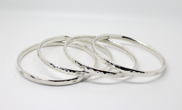 silver planished hammered bangles with feature hallmarks